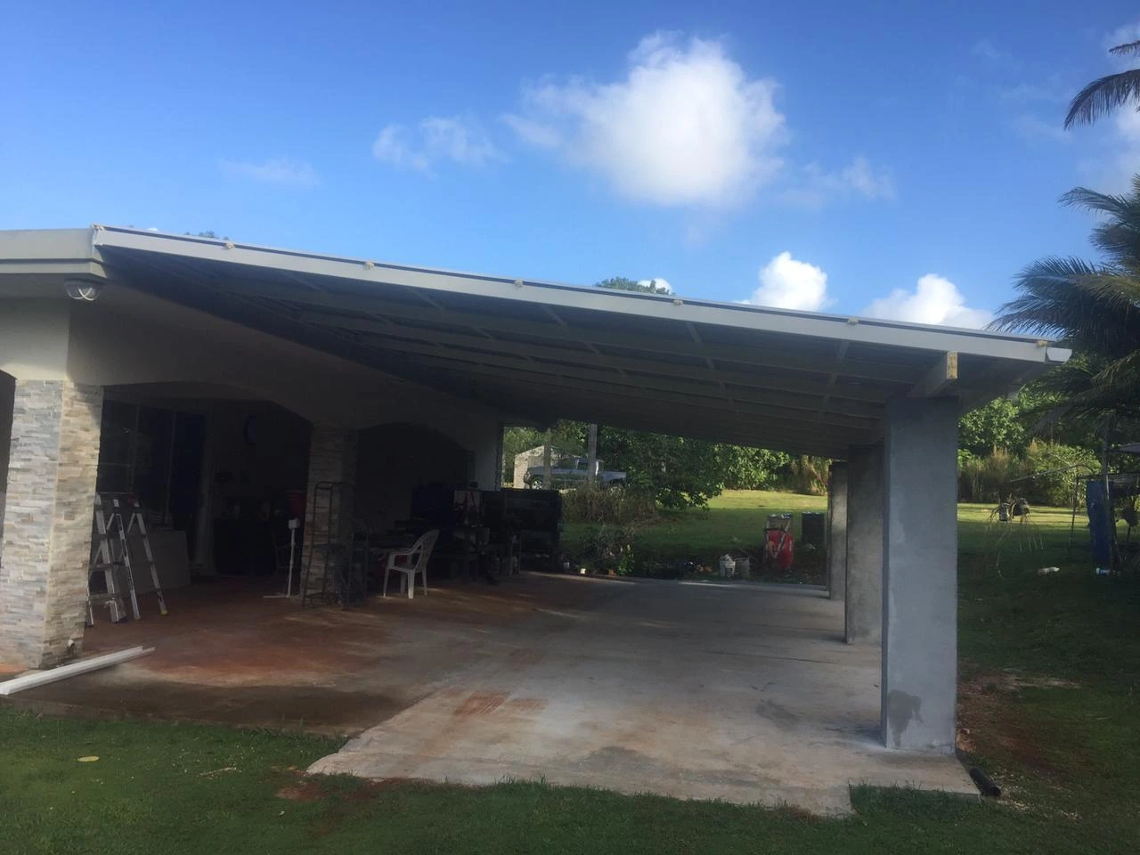 Metal carport and driveway